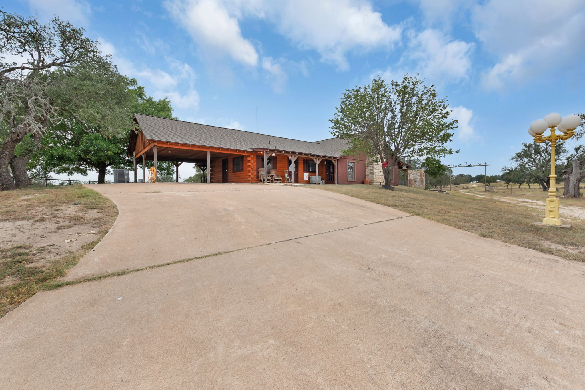 124 Old Mission Road Kempner, TX 76539 - Photo 39 of 40 front view of house with a yard and trees around