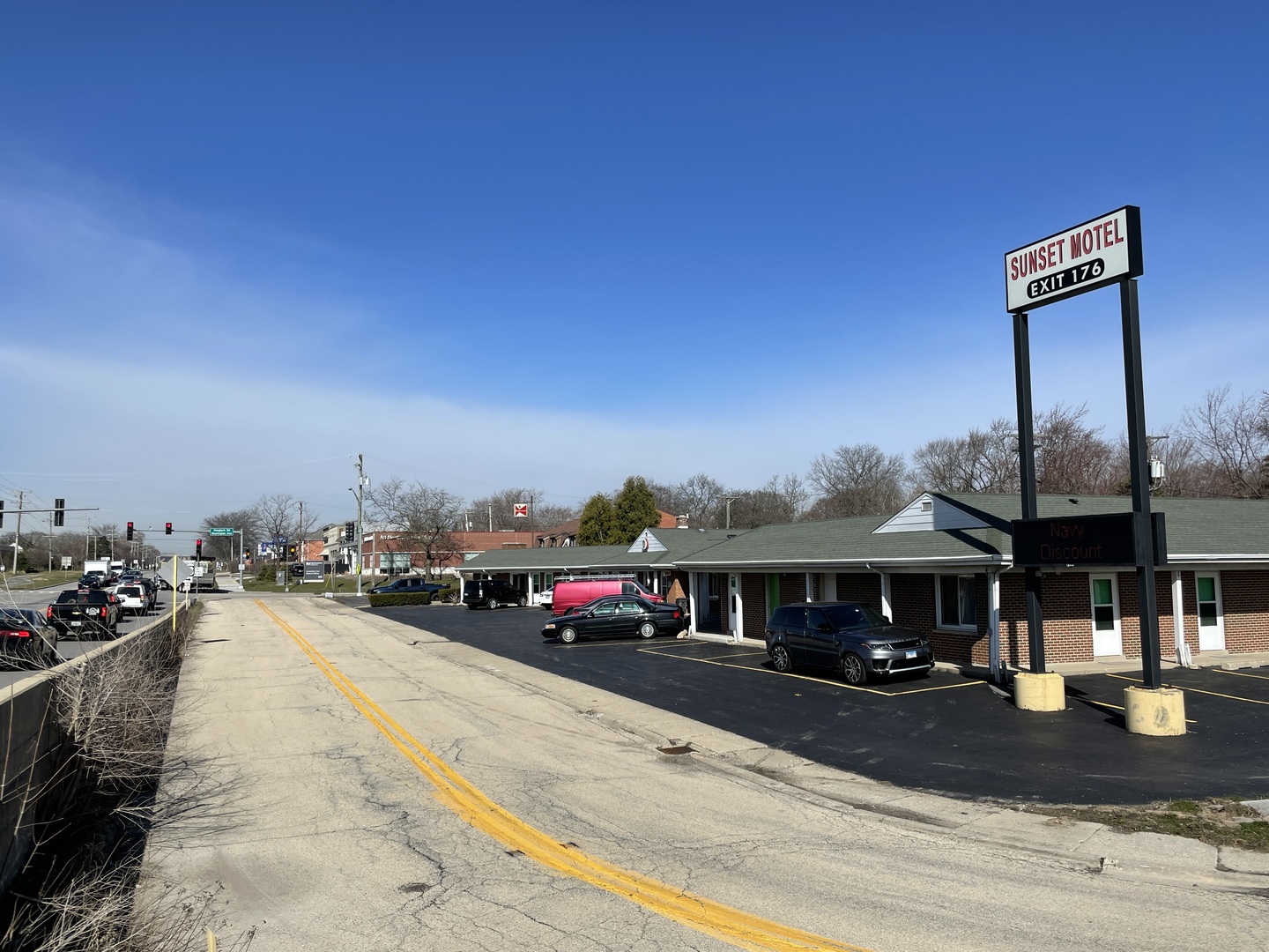 a view of a street with cars