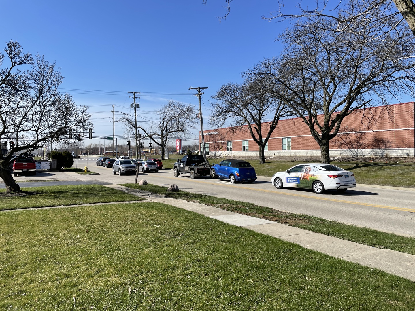511 Rockland Road Lake Bluff, IL 60044 - Photo 20 of 35 a view of a street with a cars park side of a road