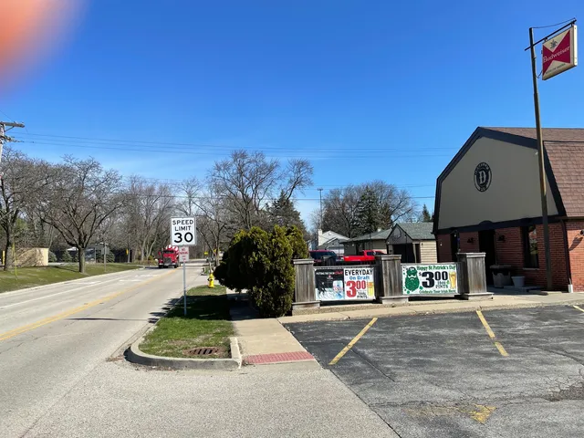 a view of street with tall buildings