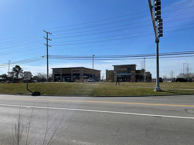 a view of a street with houses