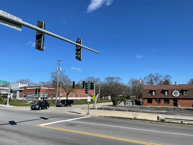 a view of a building with a street