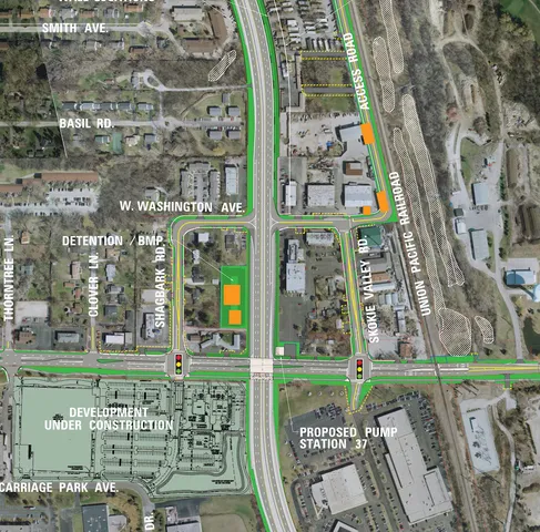 a view of a sign board with yard