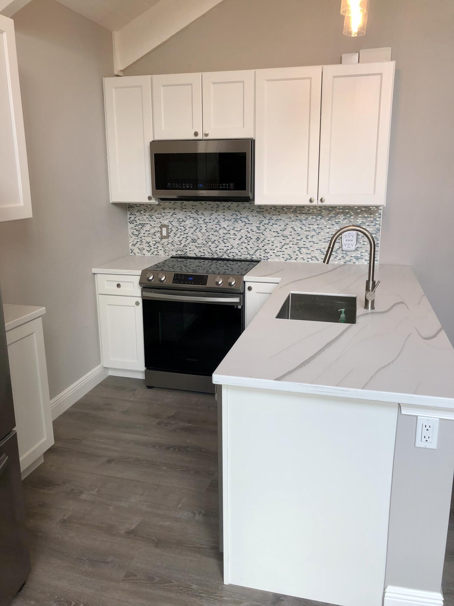 1605 Highway 1, Unit 4F Jupiter, FL 33477 - Photo 5 of 22 IMG_3381