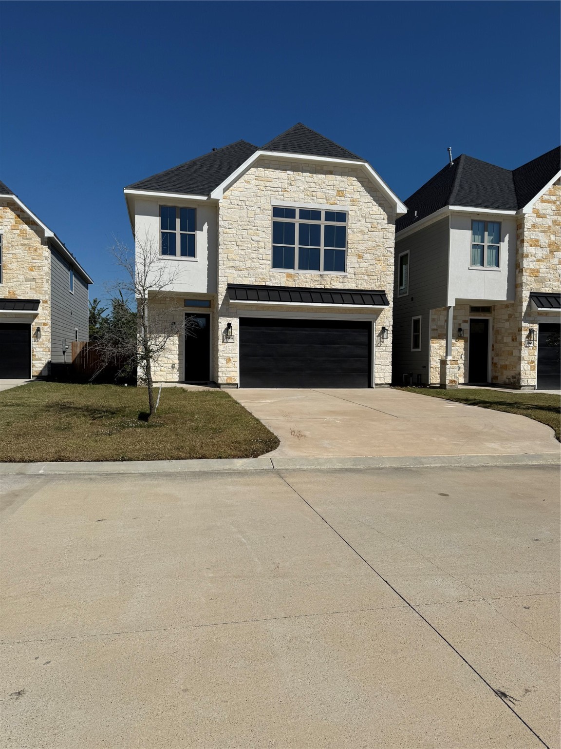 a front view of a house with yard
