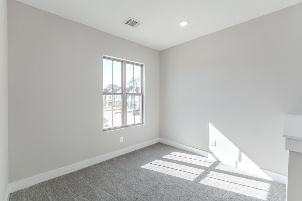 15038 Wunderlust Houston, TX 77069 - Photo 11 of 27 a view of an empty room with a window