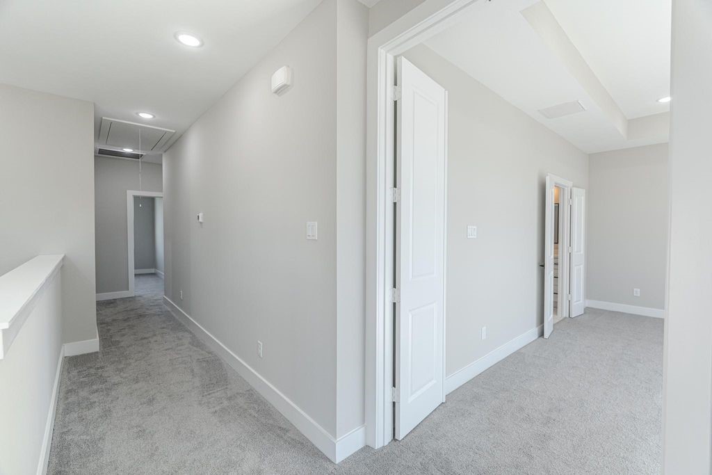 15038 Wunderlust Houston, TX 77069 - Photo 19 of 27 a view of hallway with closet