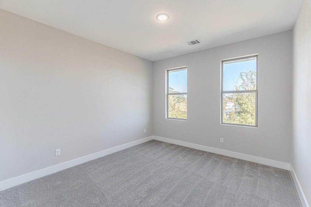 15038 Wunderlust Houston, TX 77069 - Photo 22 of 27 an empty room with a window