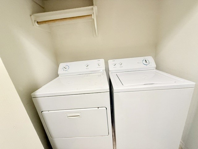 1000 Spring Loop, Unit 1806 College Station, TX 77840 - Photo 16 of 33 a utility room with dryer and washer