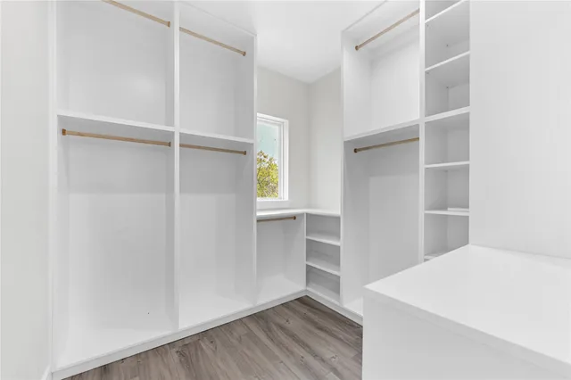 a view of an empty walk in closet