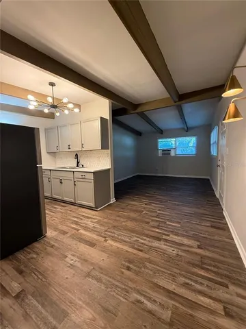 a view of kitchen and a sink