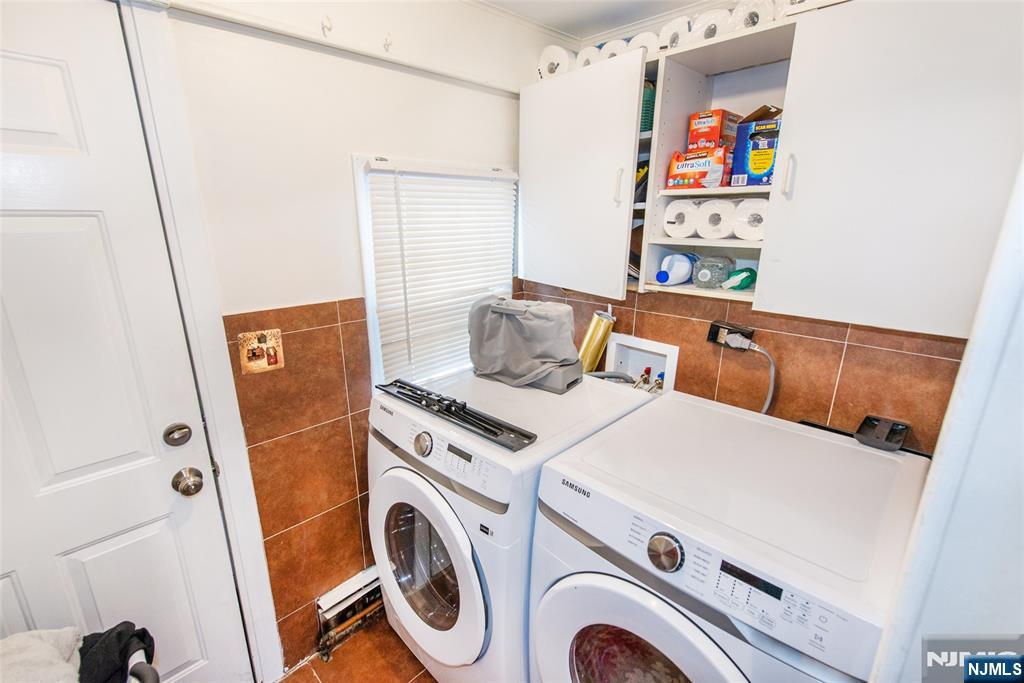 47 Hillside Road Sparta, NJ 07871 - Photo 21 of 25 a utility room with dryer and washer