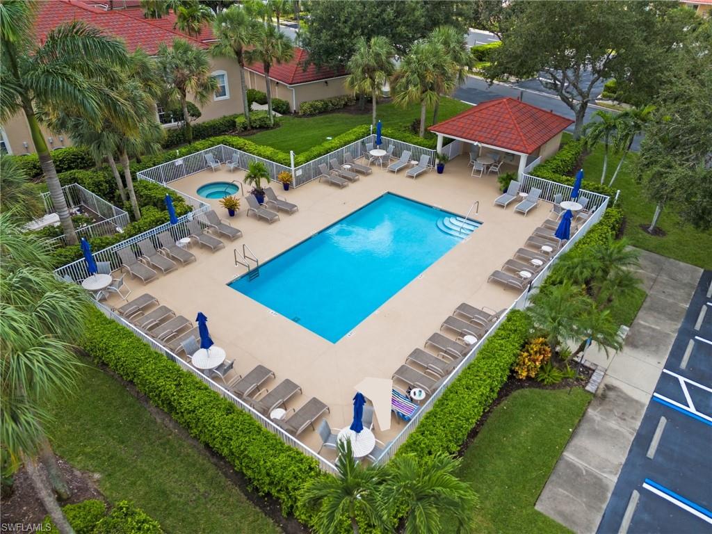 2870 Cypress Trace Circle, Unit 1723 Naples, FL 34119 - Photo 29 of 33 an aerial view of a house with a garden