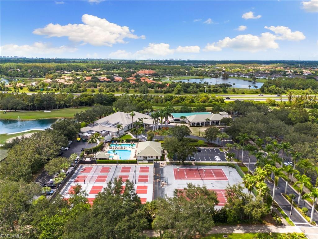 2870 Cypress Trace Circle, Unit 1723 Naples, FL 34119 - Photo 31 of 33 a view of a city
