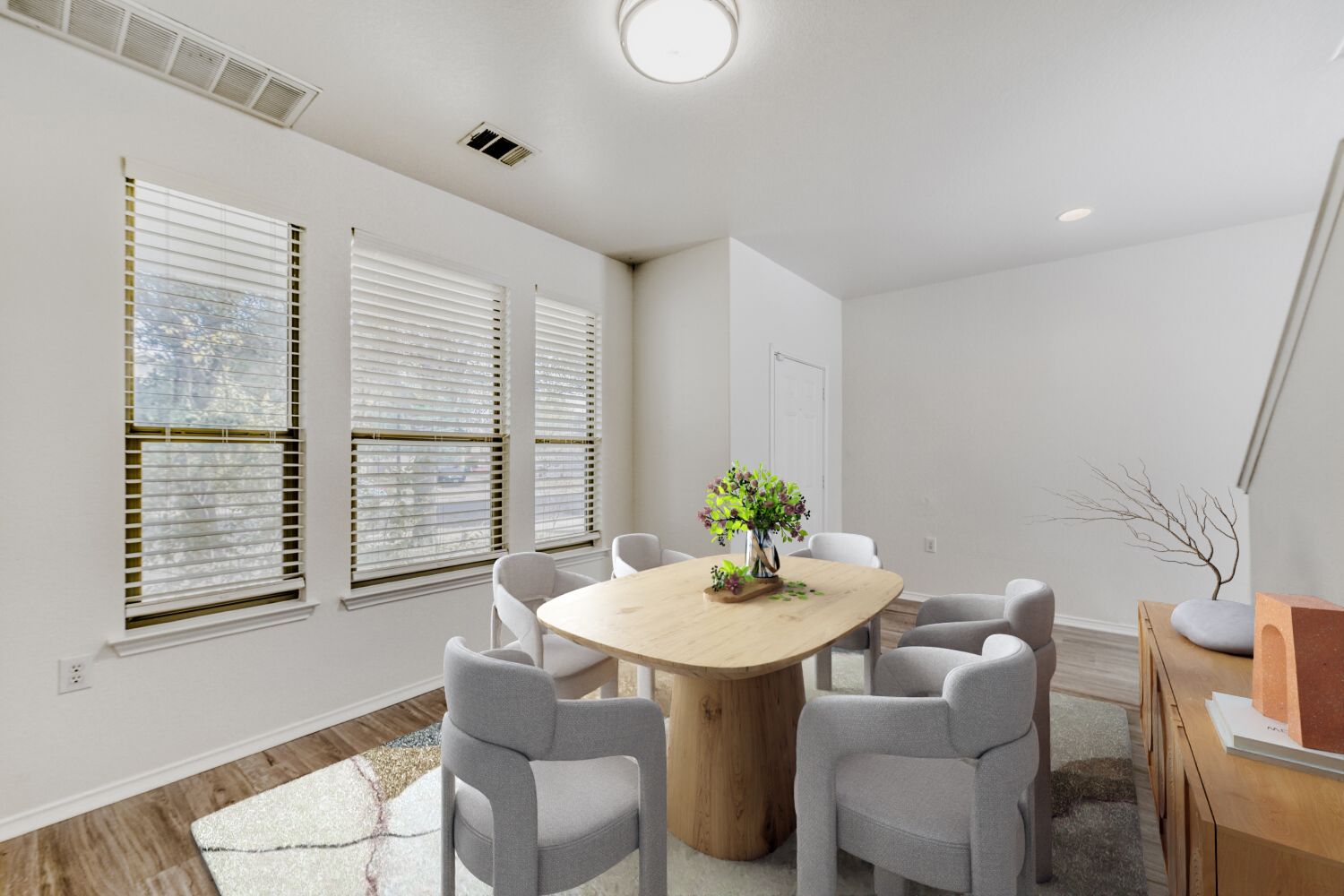 4508 Peach Grove Road Austin, TX 78744 - Photo 5 of 24 Dining space featuring light wood-style floors and recessed lighting