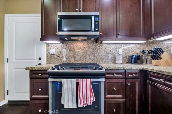 a view of staircase with wooden floor and stairs