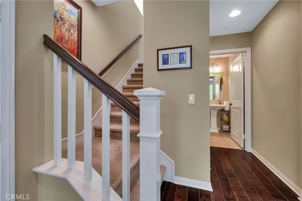 a room with furniture and wooden floor