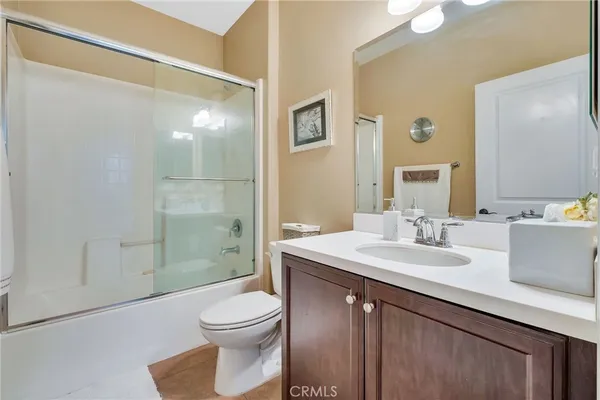 a bathroom with a shower and a bathtub