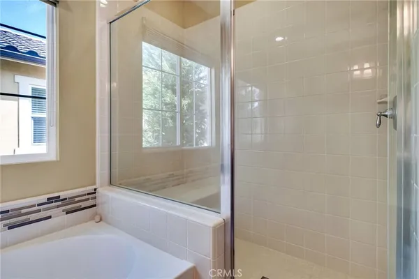 a view of backyard with outdoor seating and green space