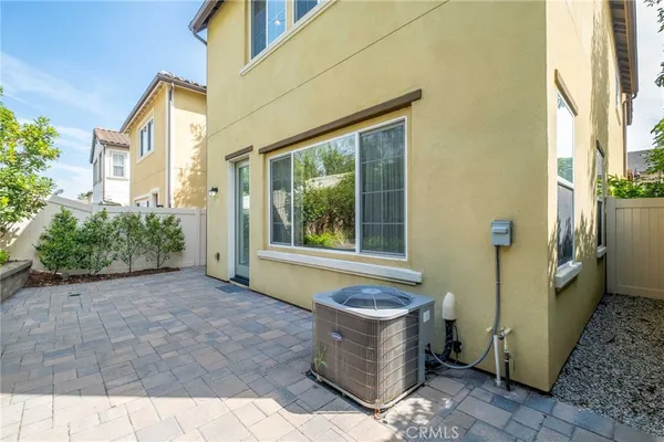 a front view of a house with a garage