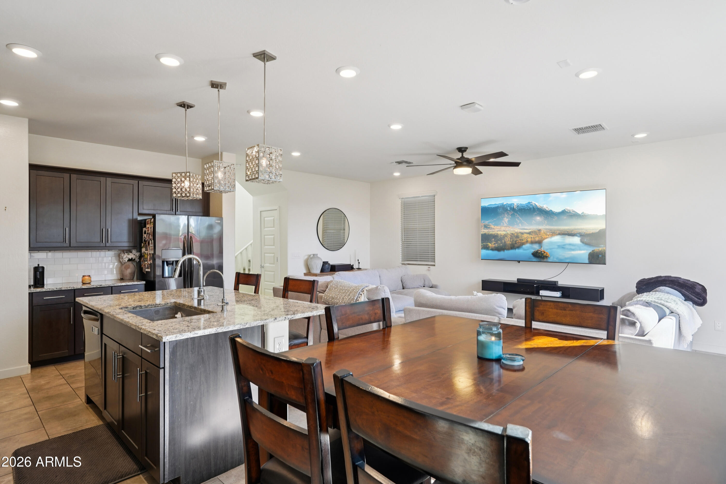 17153 North 10th Street Phoenix, AZ 85022 - Photo 13 of 48 a large kitchen with a table and chairs