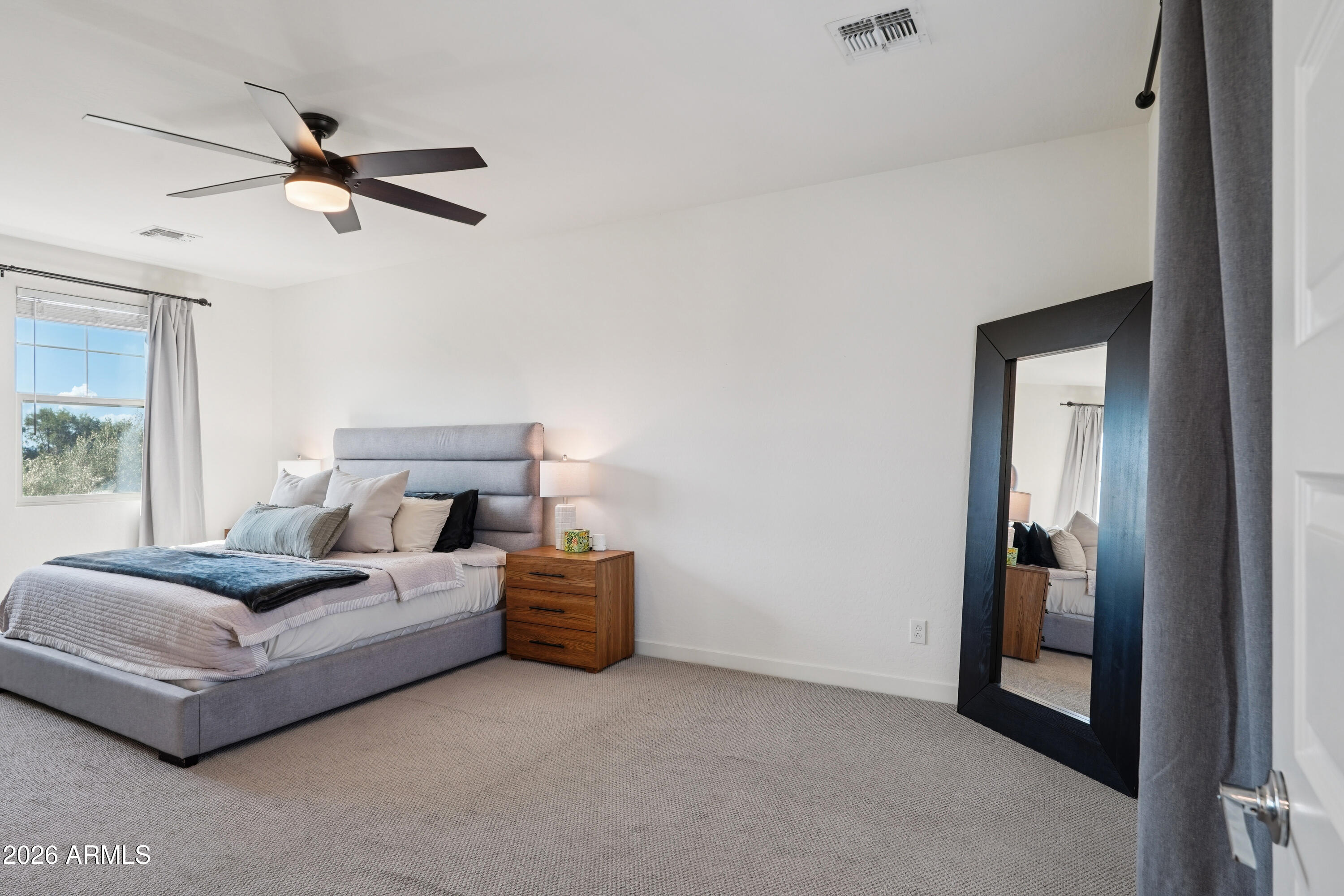 17153 North 10th Street Phoenix, AZ 85022 - Photo 24 of 48 a living room with furniture and a ceiling fan