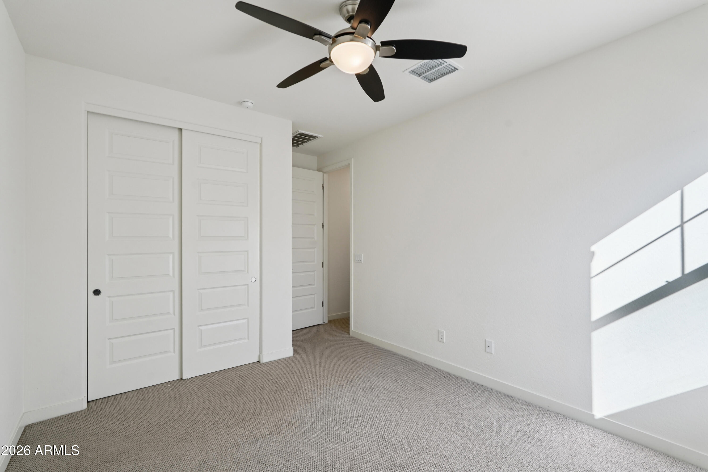 17153 North 10th Street Phoenix, AZ 85022 - Photo 36 of 48 an empty room with closet area