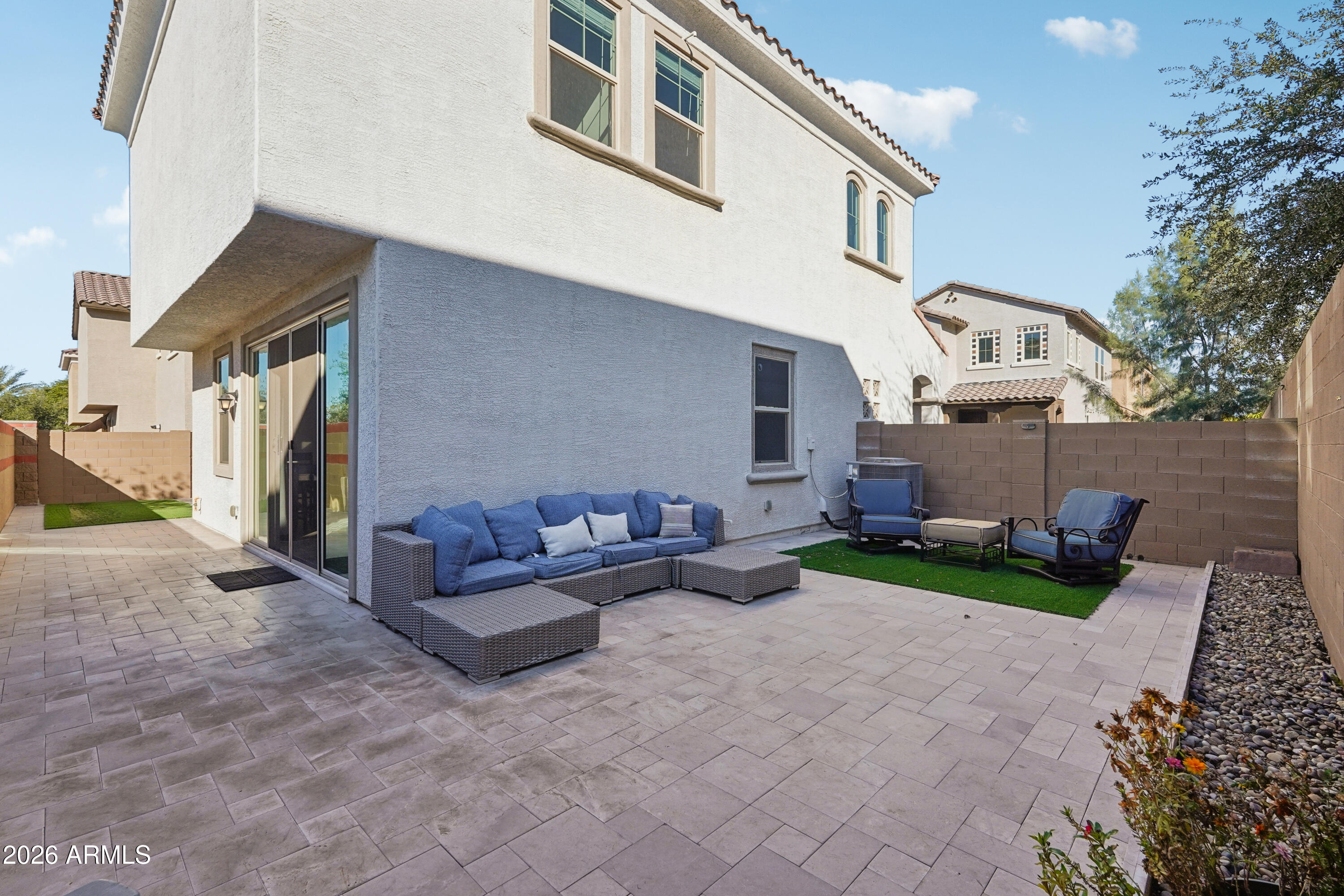 17153 North 10th Street Phoenix, AZ 85022 - Photo 4 of 48 a view of a house with backyard and sitting area