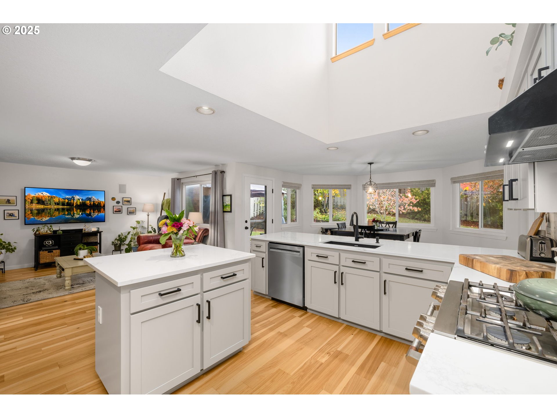 12808 Southwest Falcon Rise Drive Portland, OR 97223 - Photo 12 of 46 a kitchen with a sink stove and cabinets