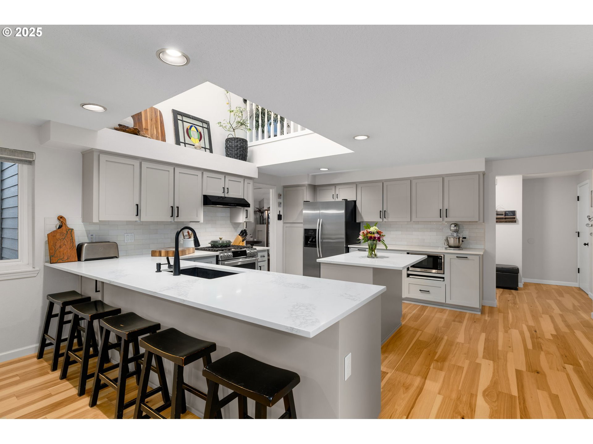 12808 Southwest Falcon Rise Drive Portland, OR 97223 - Photo 18 of 46 a kitchen with a sink cabinets and counter space