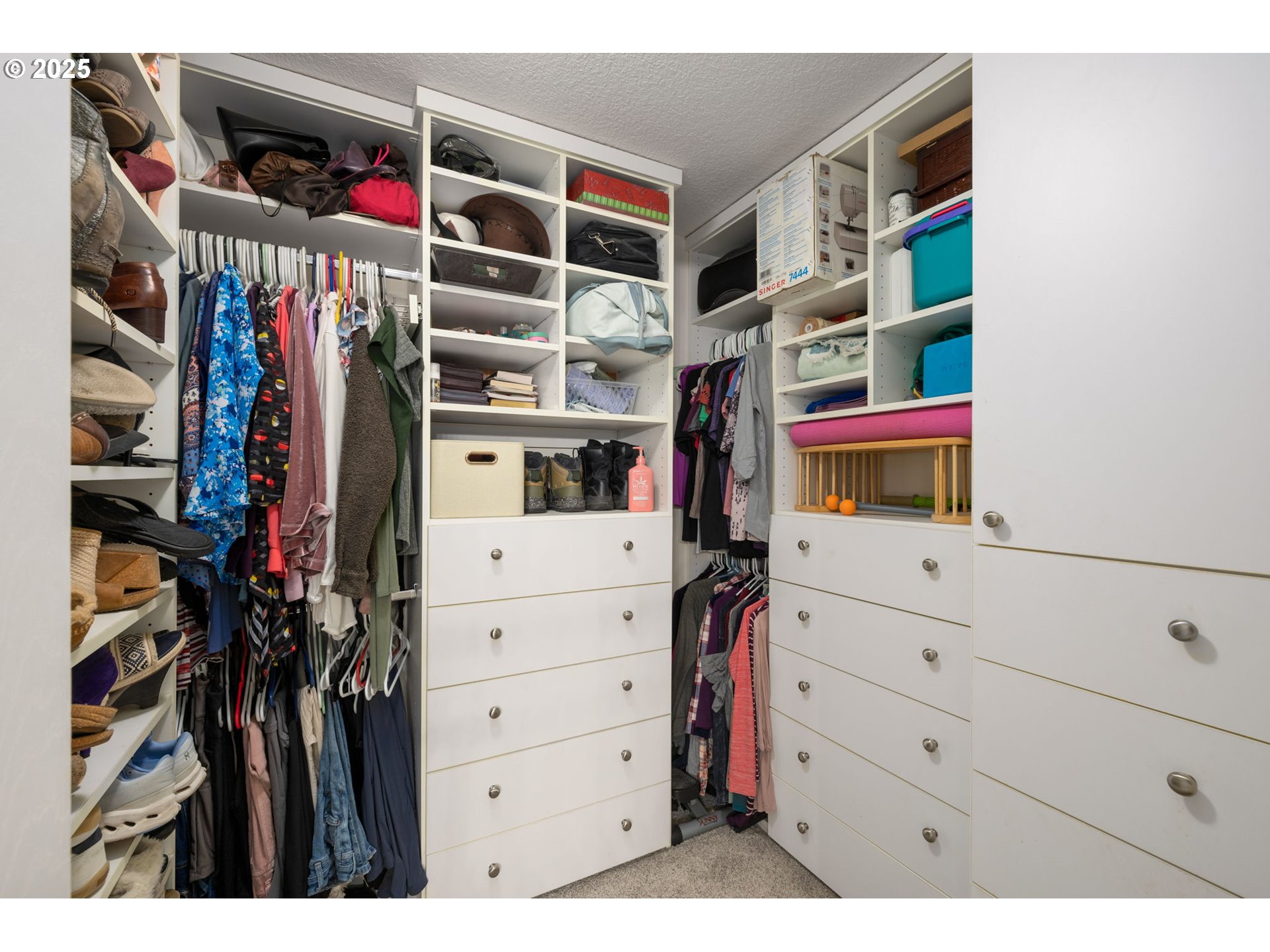12808 Southwest Falcon Rise Drive Portland, OR 97223 - Photo 38 of 46 a view of walk in closet with clothes and shoes