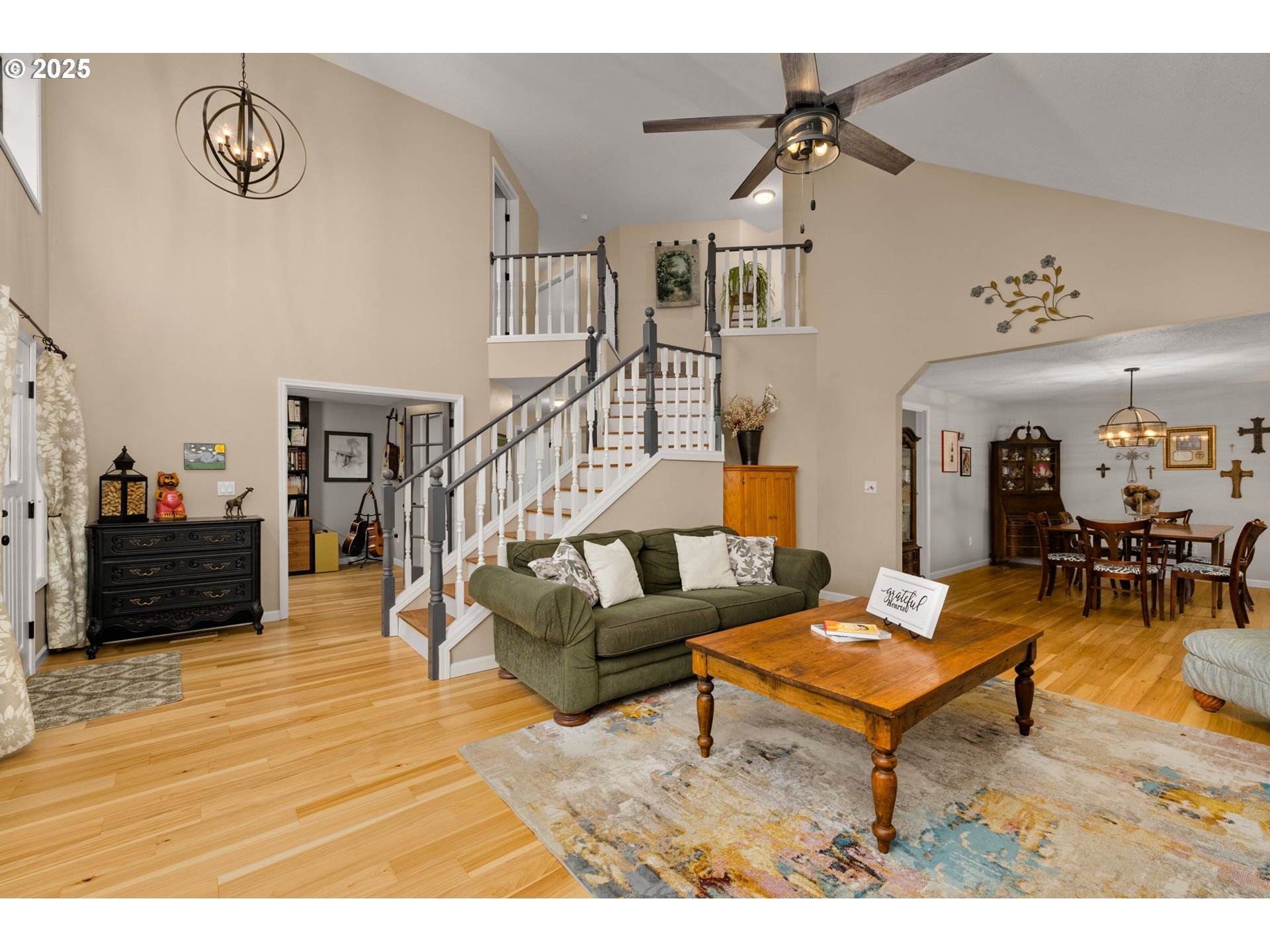 12808 Southwest Falcon Rise Drive Portland, OR 97223 - Photo 7 of 46 a living room with furniture and a wooden floor
