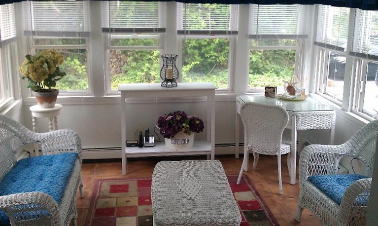 25 Centerville Avenue Centerville, MA 02632 - Photo 2 of 24 a living room with furniture and a potted plant