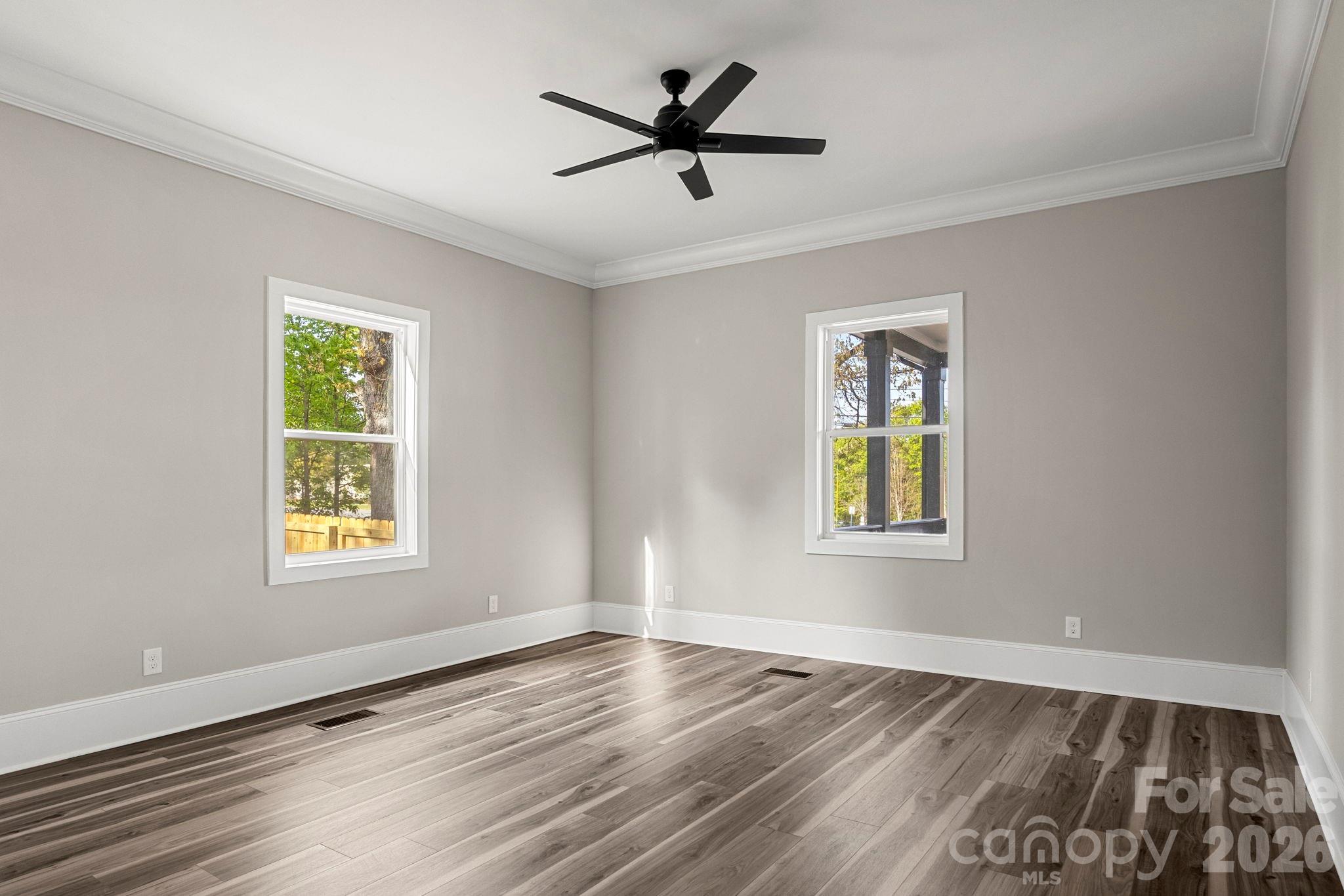918 North New Hope Road Gastonia, NC 28054 - Photo 22 of 37 a view of an empty room with window and wooden floor