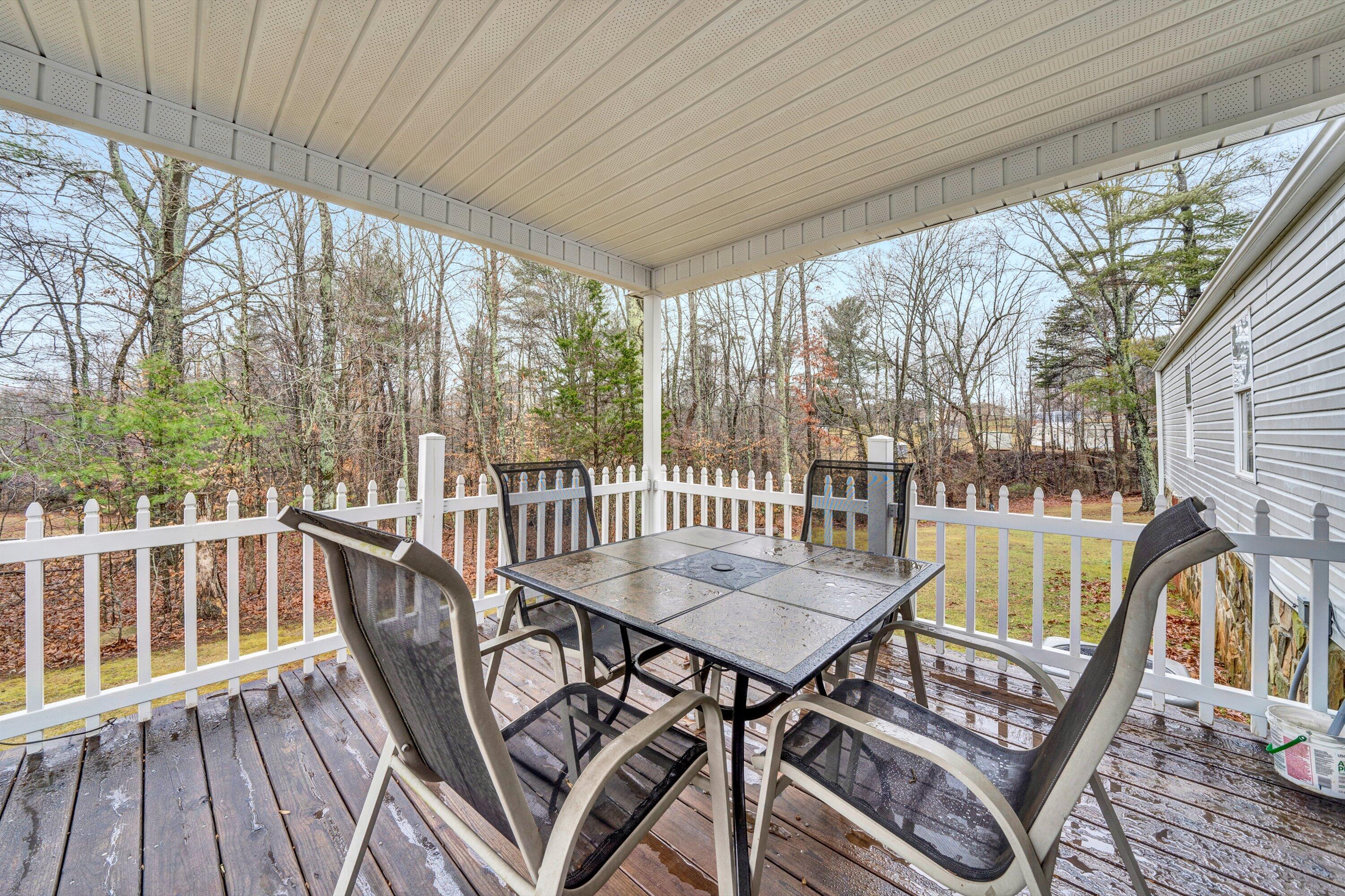706 Telegraph Road Henry, VA 24102 - Photo 16 of 17 a view of a balcony with furniture and wooden floor