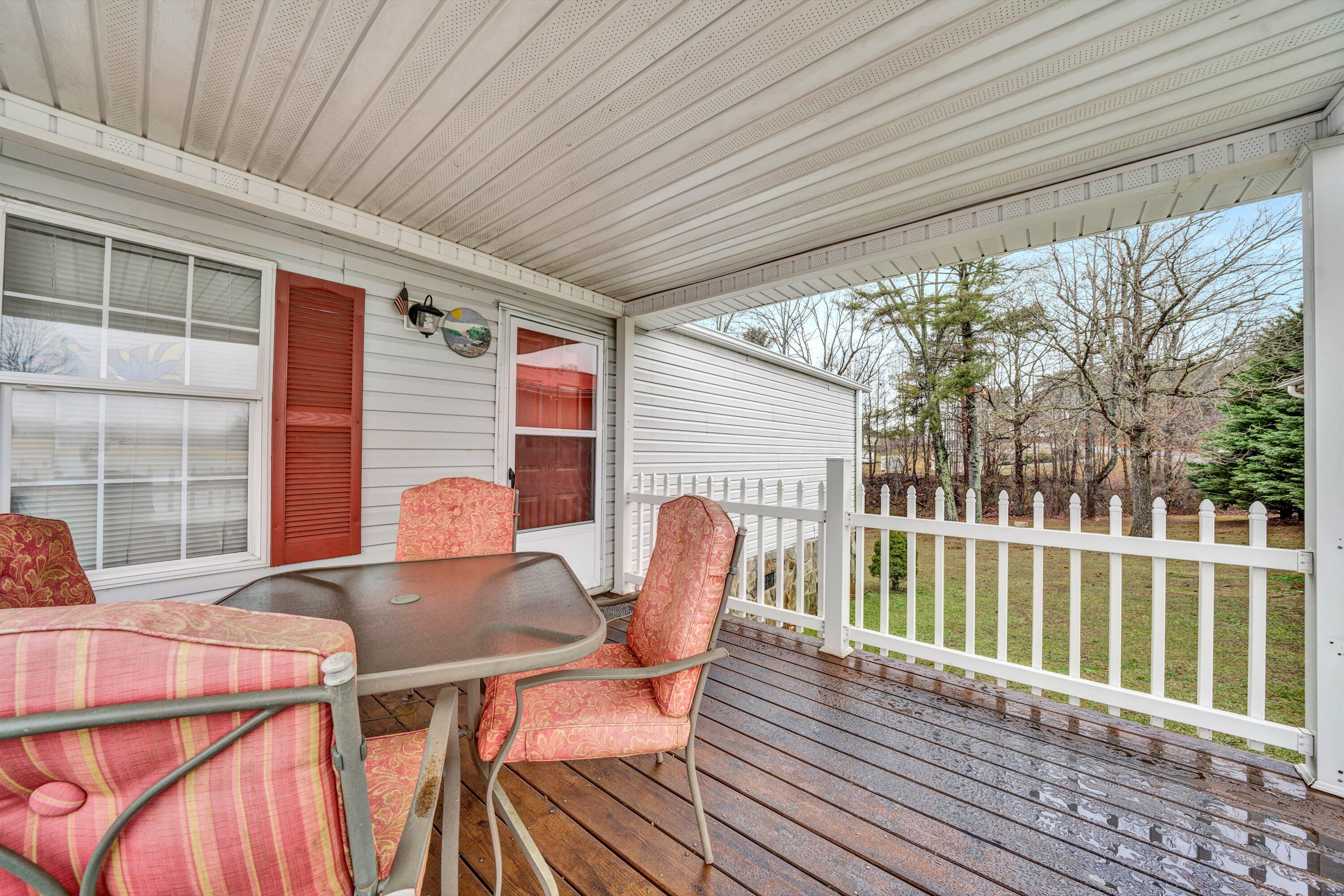 706 Telegraph Road Henry, VA 24102 - Photo 5 of 17 a view of a patio on wooden deck