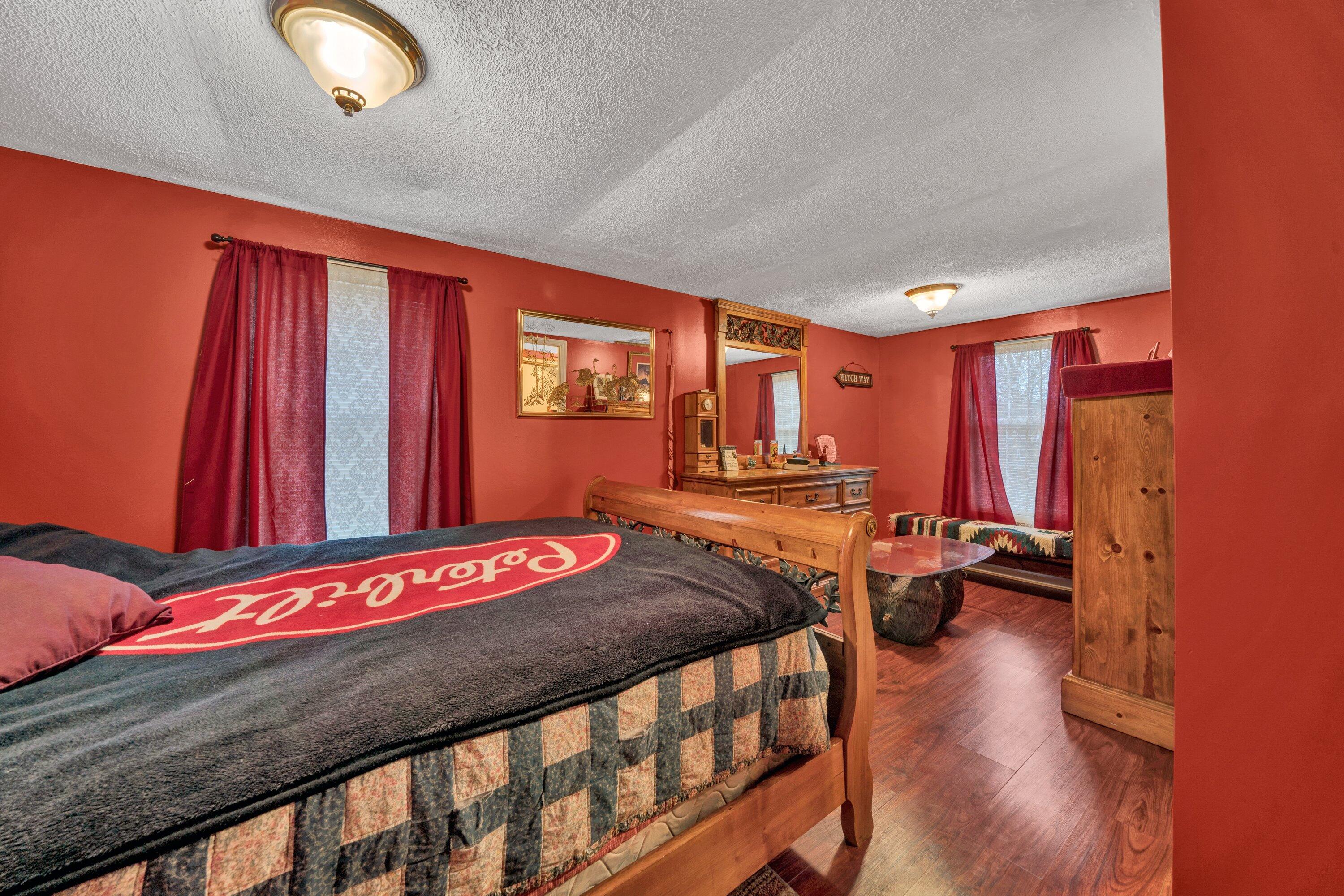 706 Telegraph Road Henry, VA 24102 - Photo 9 of 17 a bedroom with a bed and a window