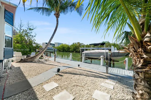 a view of a backyard with a patio