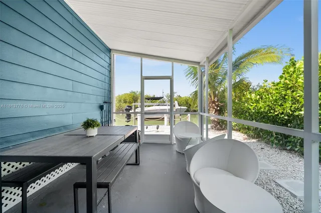 a outdoor dining space with furniture