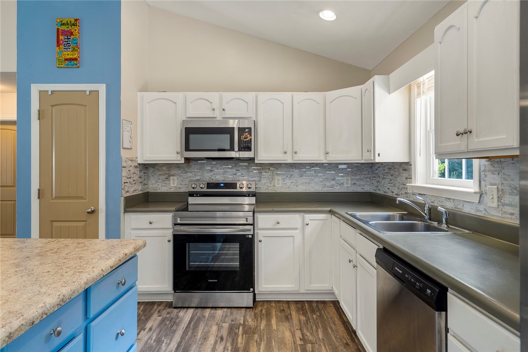 167 Mediterranean Avenue Anderson, SC 29621 - Photo 16 of 33 Culinary delights await in this bright kitchen, complete with modern appliances and ample storage.