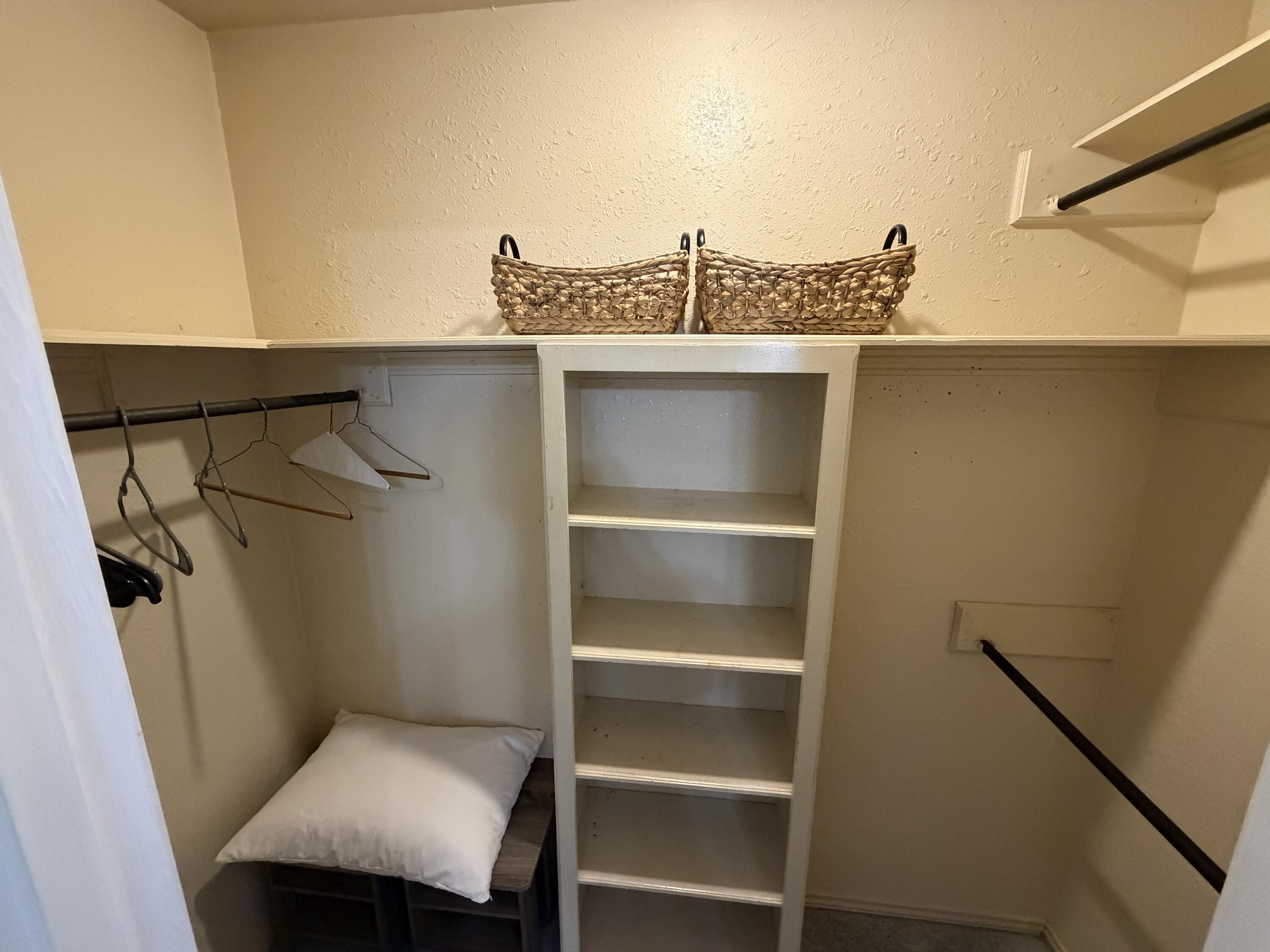 3236 94th Street Lubbock, TX 79423 - Photo 11 of 31 a utility room with washer and dryer