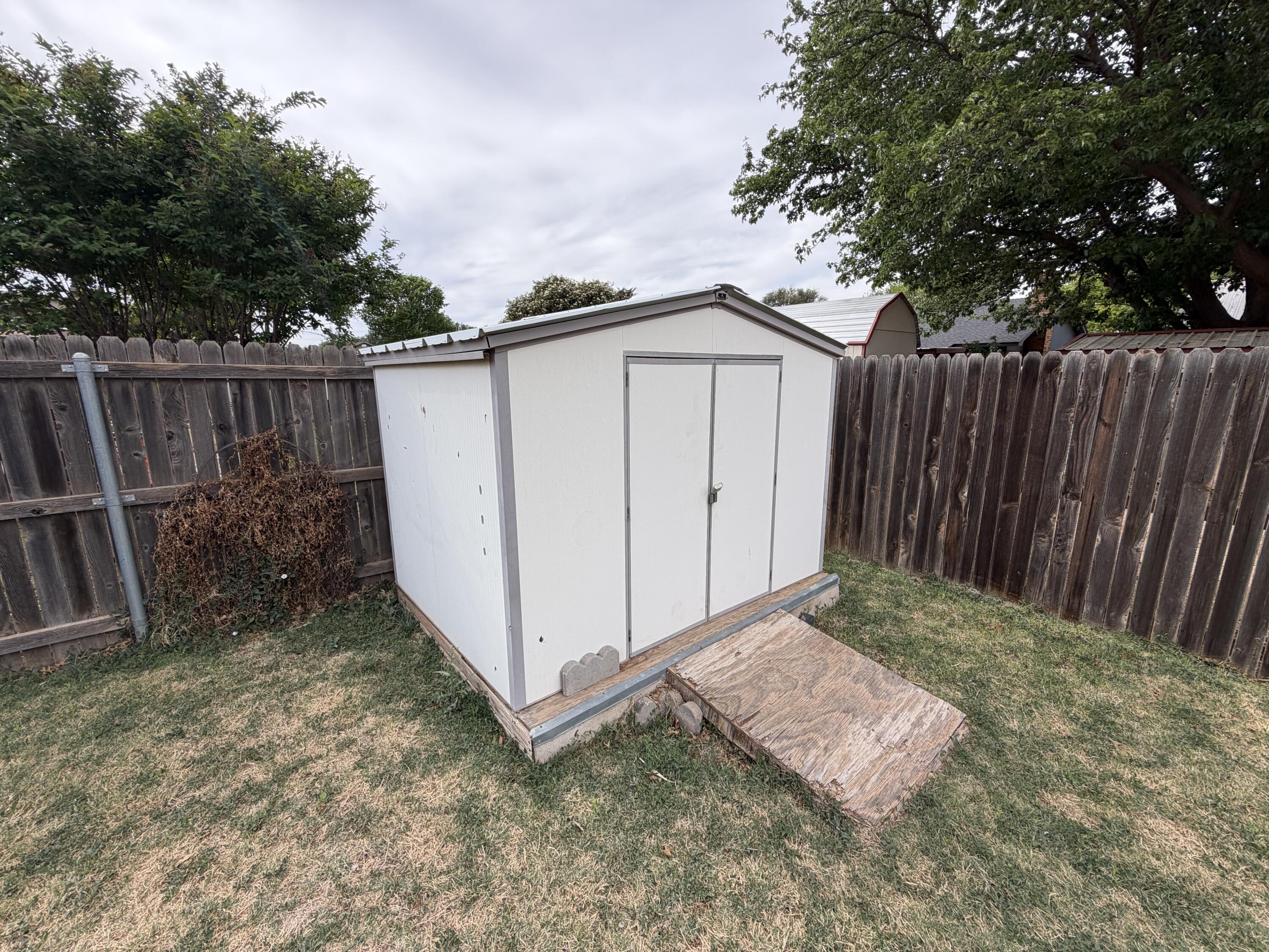 3236 94th Street Lubbock, TX 79423 - Photo 29 of 31 a view of a backyard