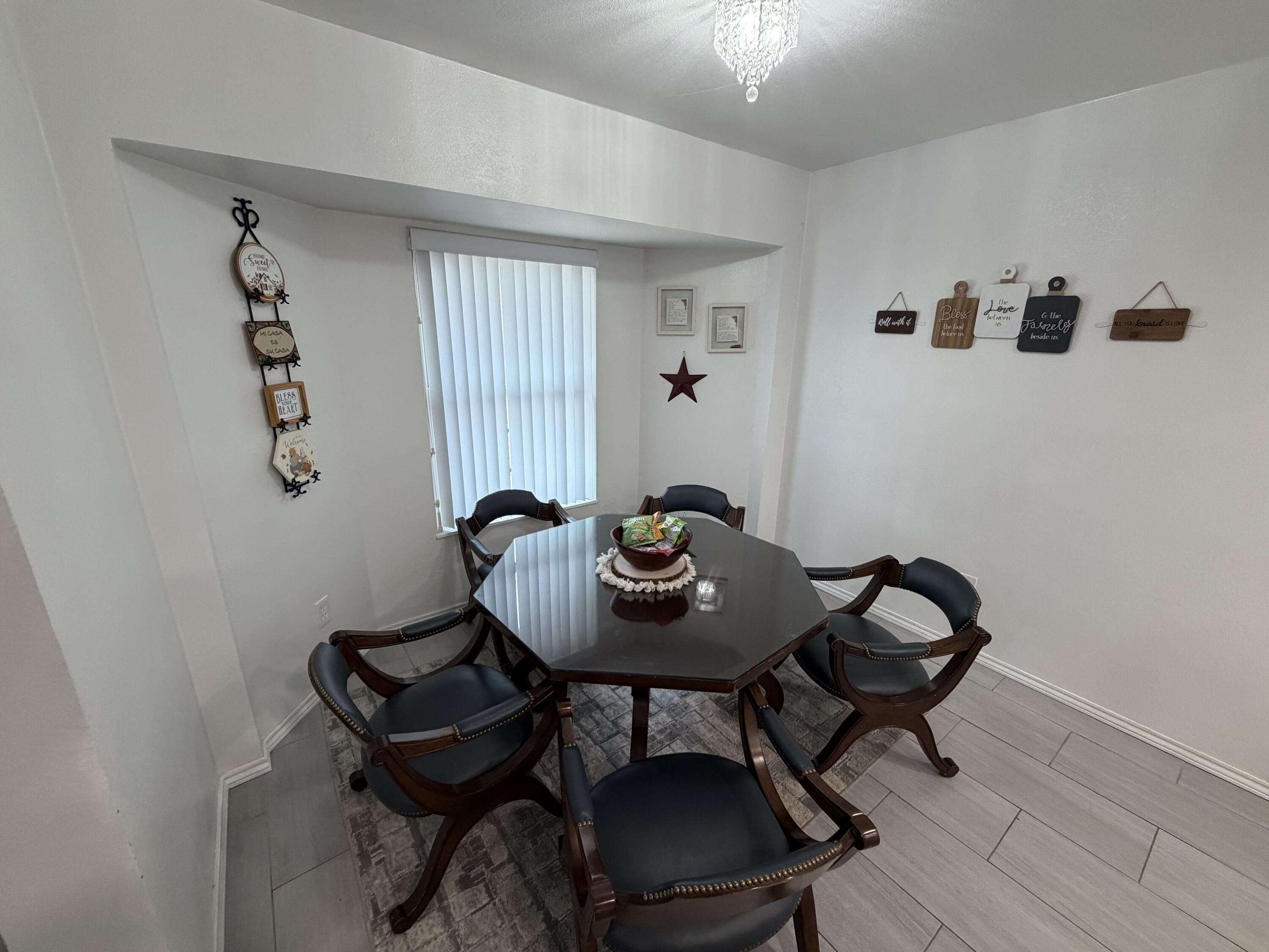 3236 94th Street Lubbock, TX 79423 - Photo 8 of 31 a view of a livingroom and dining room