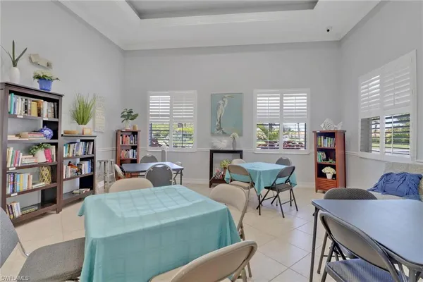 a kitchen with a sink cabinets and window