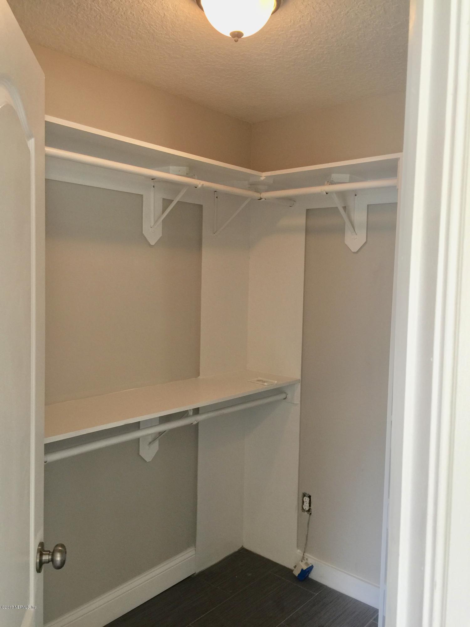 4861 Herton Road Jacksonville, FL 32258 - Photo 13 of 26 Master closet 1 with built-ins