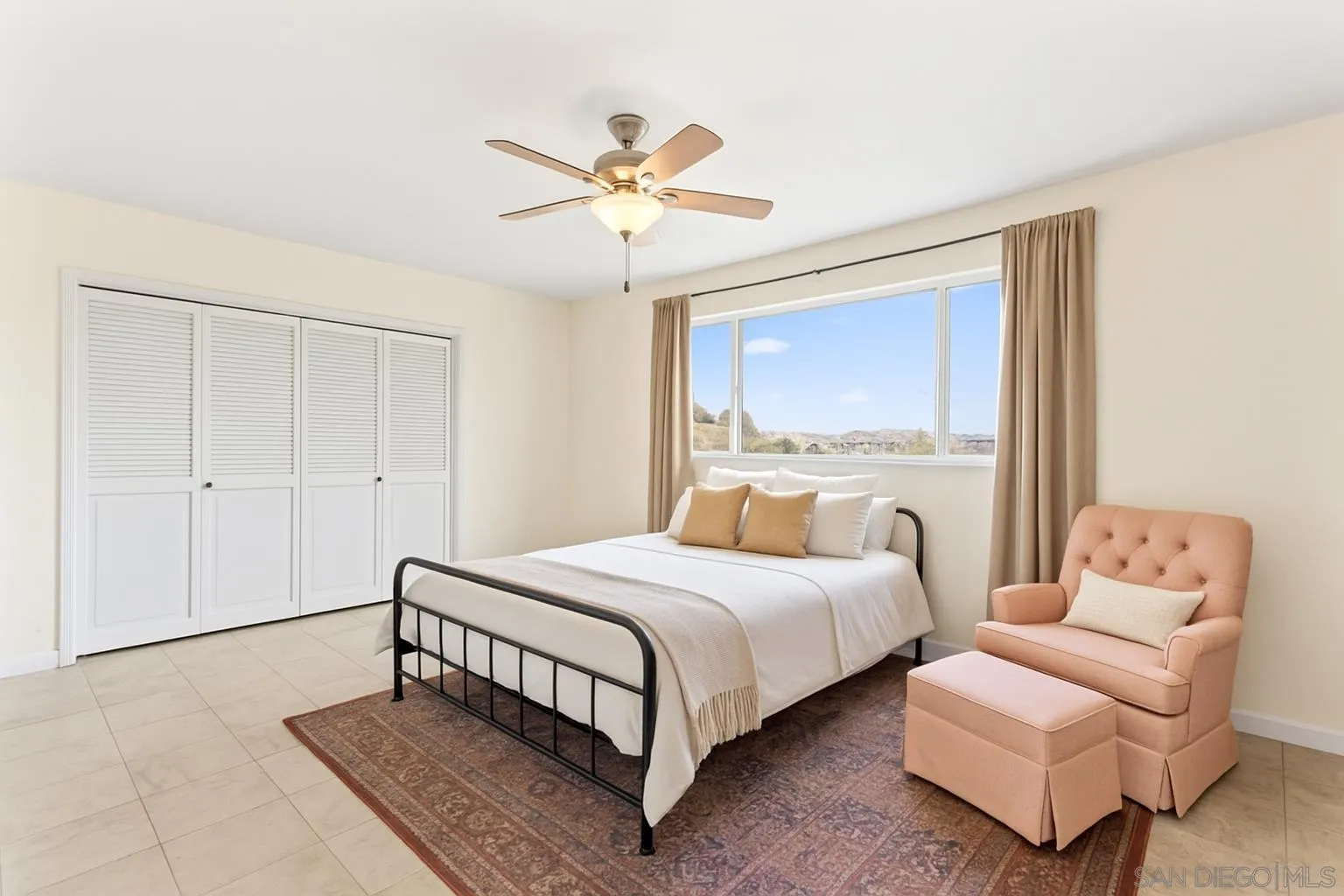 732 Hamilton Lane Fallbrook, CA 92028 - Photo 28 of 54 a bedroom with a bed and a couch