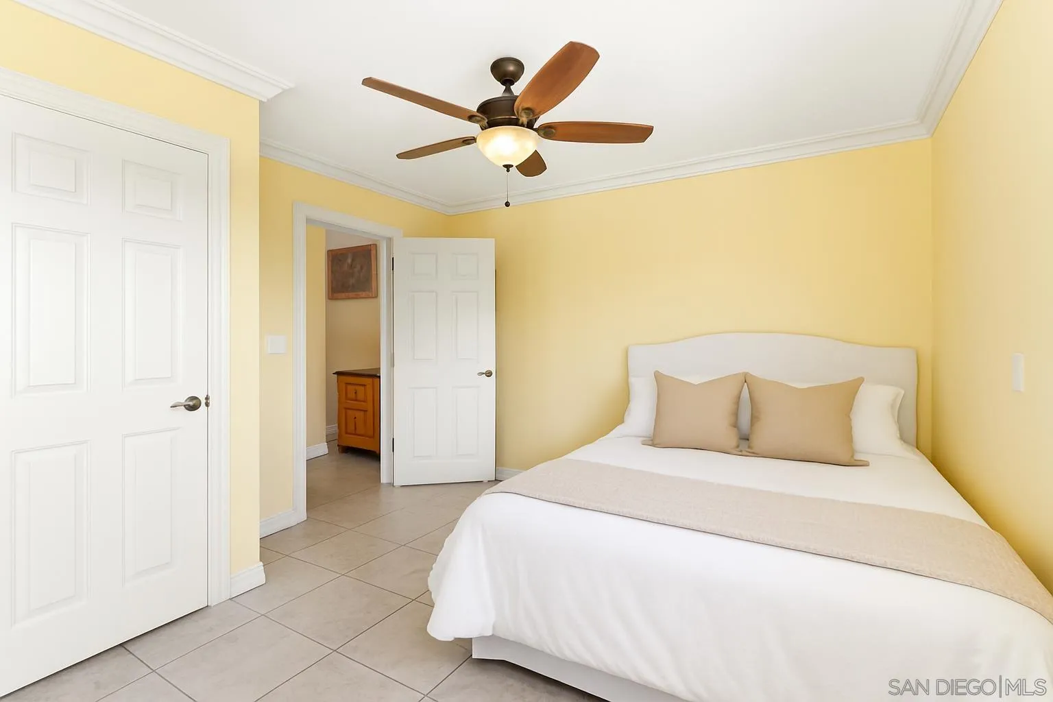 732 Hamilton Lane Fallbrook, CA 92028 - Photo 30 of 54 a bedroom with a bed and a ceiling fan