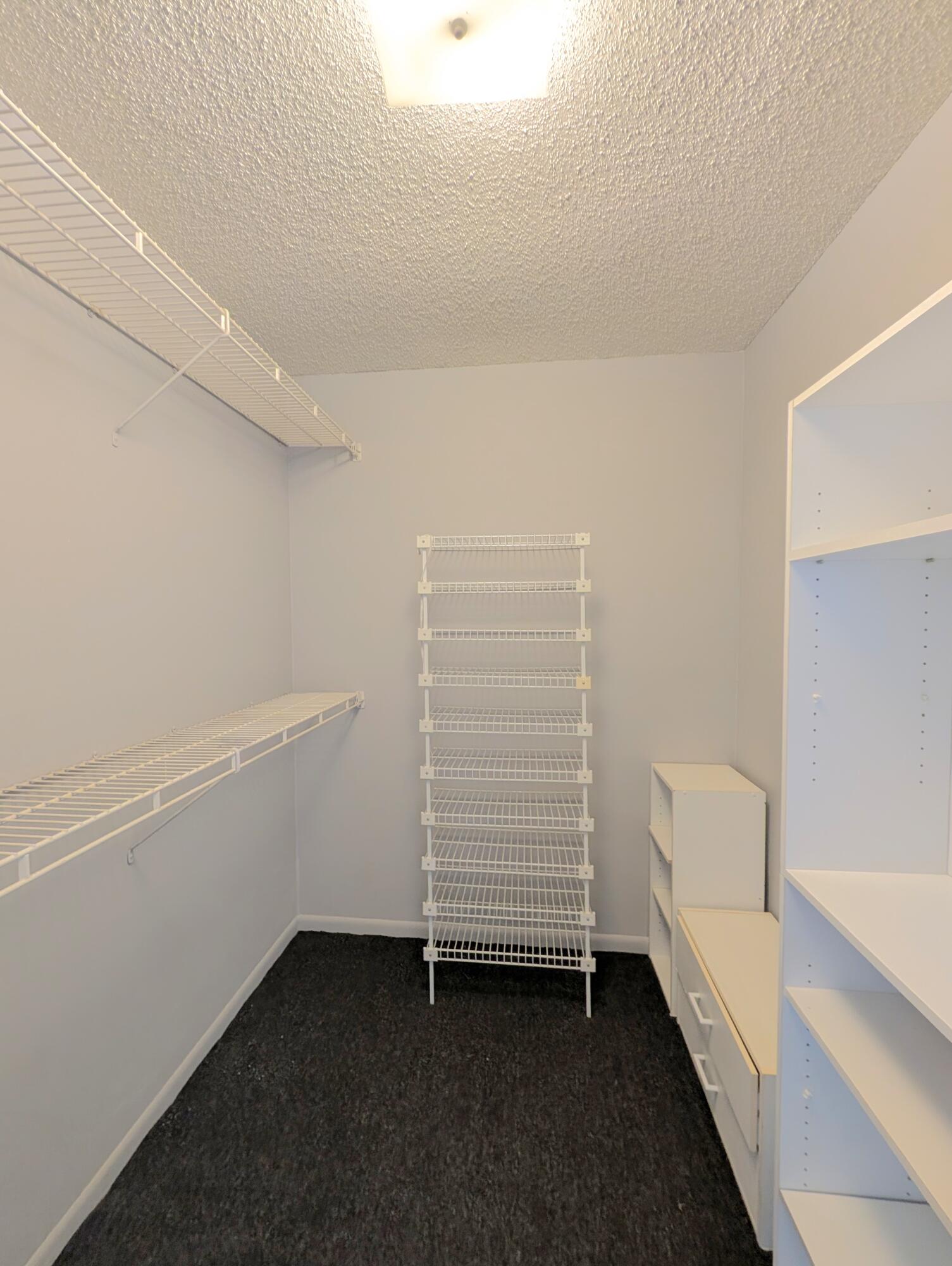 5700 Northwest 2nd Avenue, Unit 509 Boca Raton, FL 33487 - Photo 11 of 20 a view of room and closet