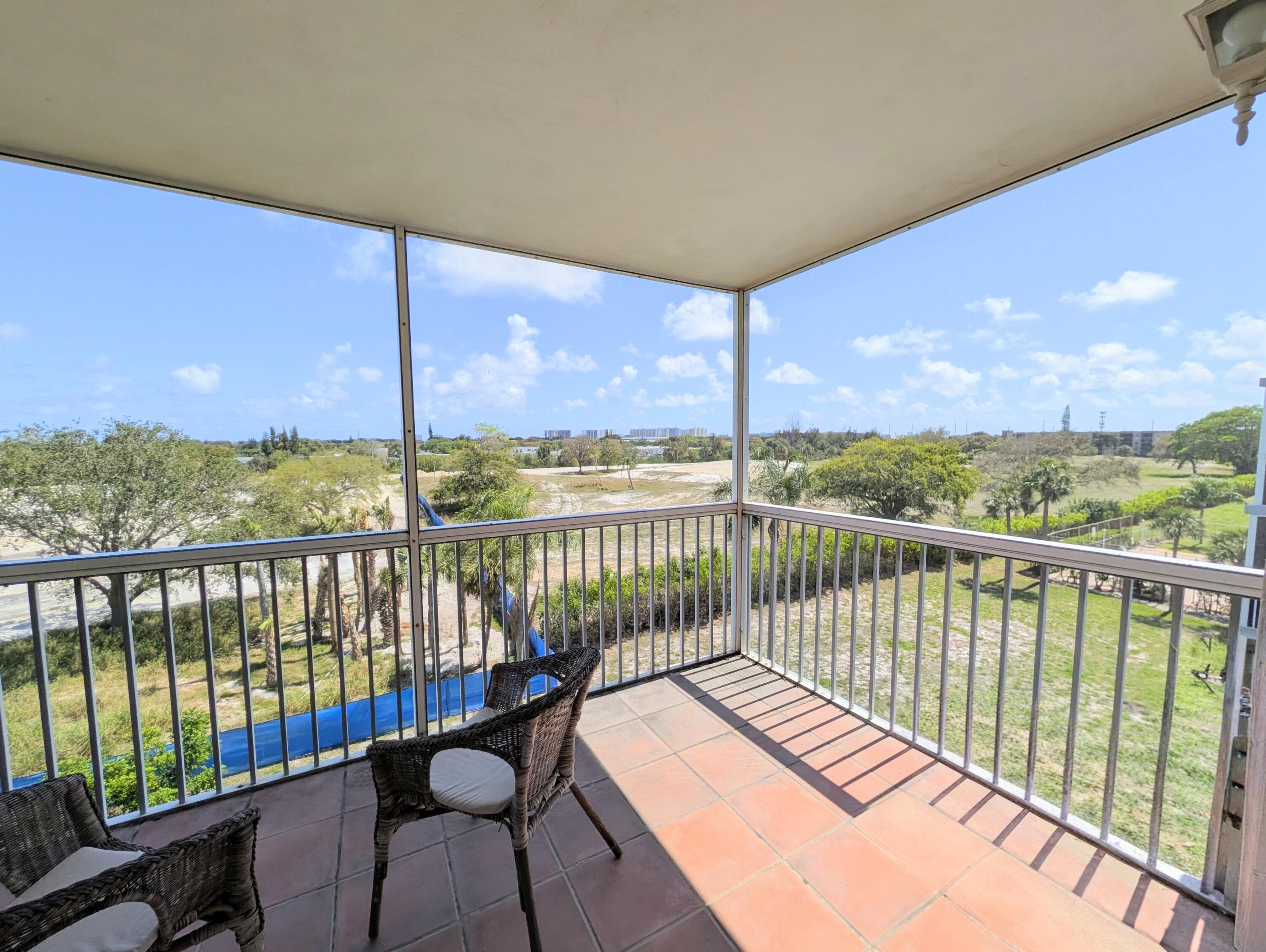 5700 Northwest 2nd Avenue, Unit 509 Boca Raton, FL 33487 - Photo 15 of 20 a view of city from a balcony