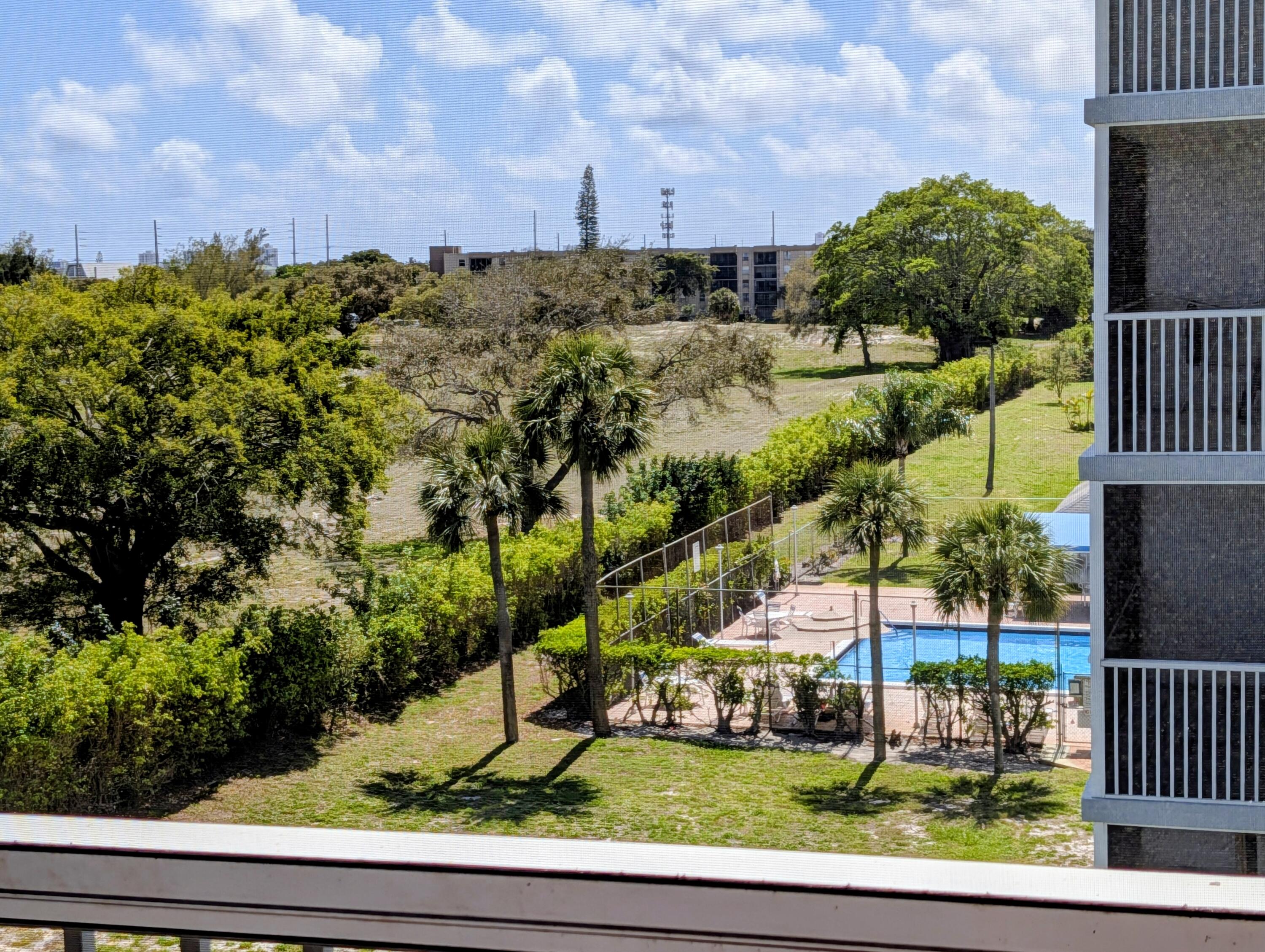 5700 Northwest 2nd Avenue, Unit 509 Boca Raton, FL 33487 - Photo 16 of 20 a view of a yard with plants